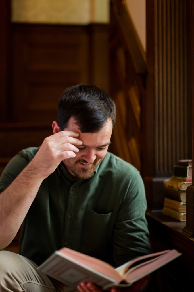 Seth Ring Fantasy Author reading a book.